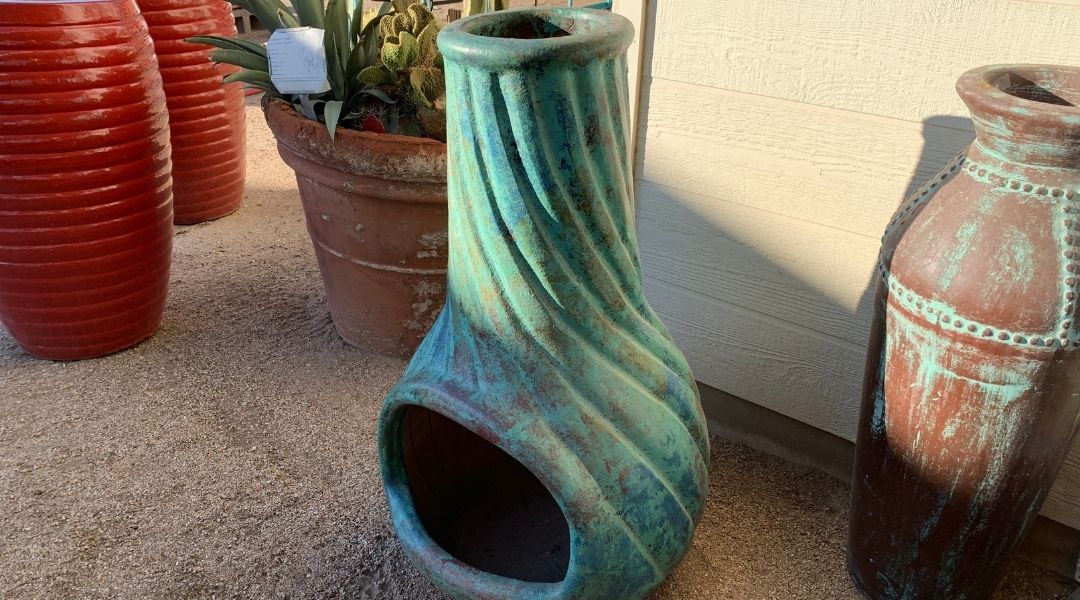 A chiminea with a blue green glaze at Green Things Nursery in Tucson
